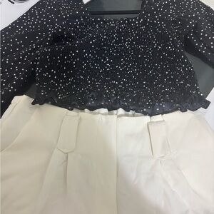Black and White Polka Dot Top with Cream Shorts
